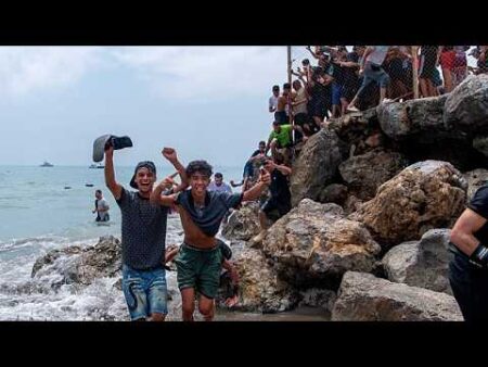At least 60,000 migrants cross into Spanish territory of Ceuta from Morocco in a single day