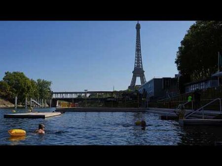 Parisians are now flying above the Seine on electric surfboards Parisians are now flying above the Seine on electric surfboards