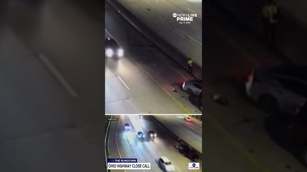 Person narrowly escapes car on freeway shoulder