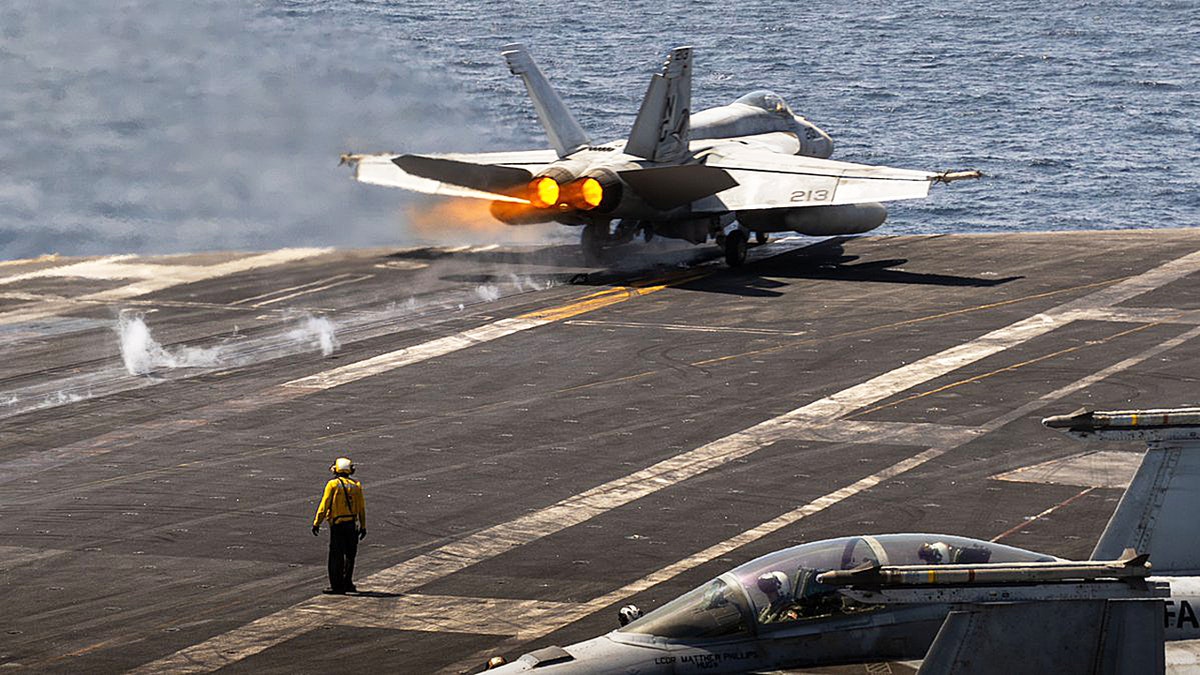 U.S. Navy fighter jet takes off from aircraft carrier