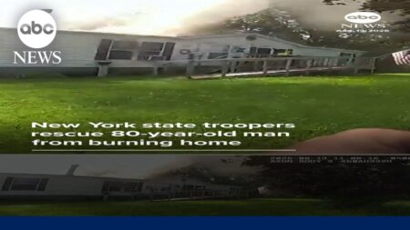 New York state troopers rescue 80-year-old man from burning home