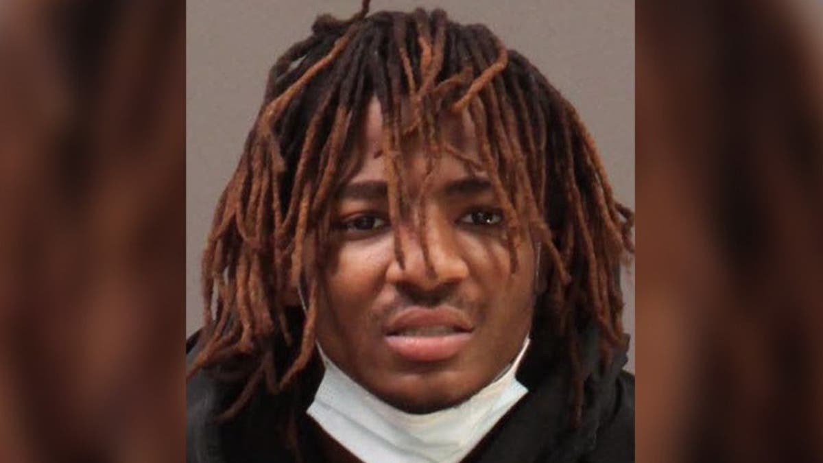 image shows previous mugshot for Hughes