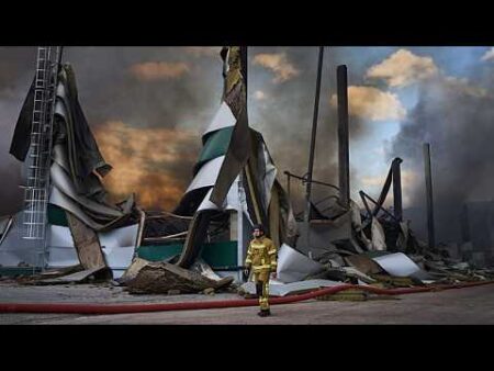 Russian drone strikes hit Ukraine as warehouses burn