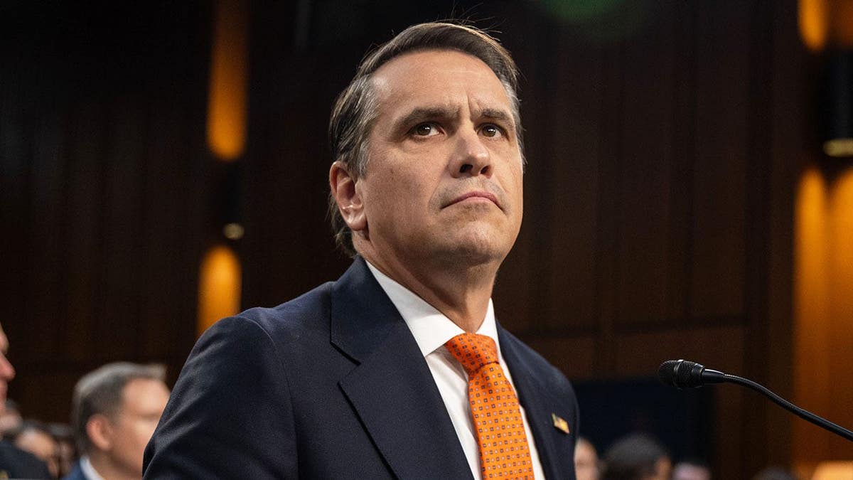 Todd Blanche stands before a Senate Judiciary Committee hearing room in Washington, D.C.