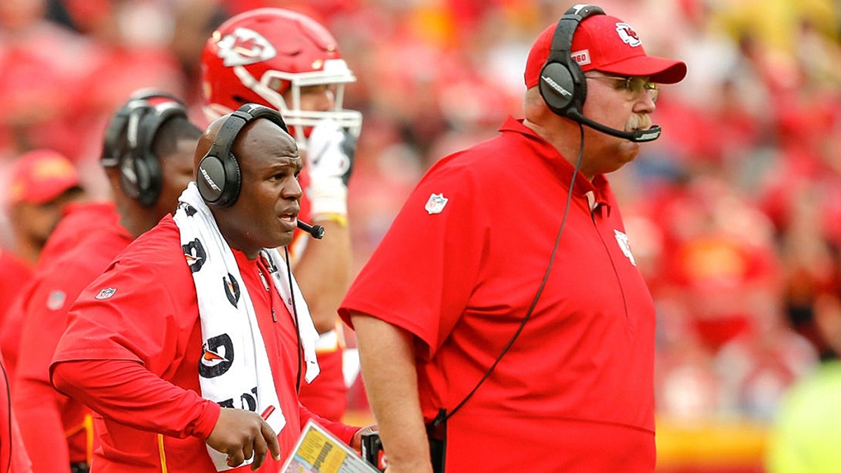 KANSAS CITY, MO - SEPTEMBER 22: Kansas City Chiefs offenisve coordinator Eric Bieniemy watches the offensive unit with head coach Andy Reid of the Kansas City Chiefs, right, at Arrowhead Stadium on September 22, 2019 in Kansas City, Missouri. (Photo by David Eulitt/Getty Images)