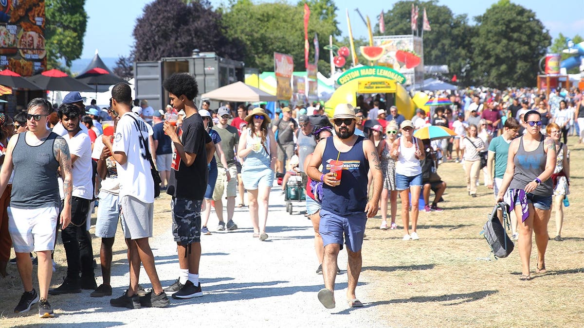 View of people walking around during Seafair