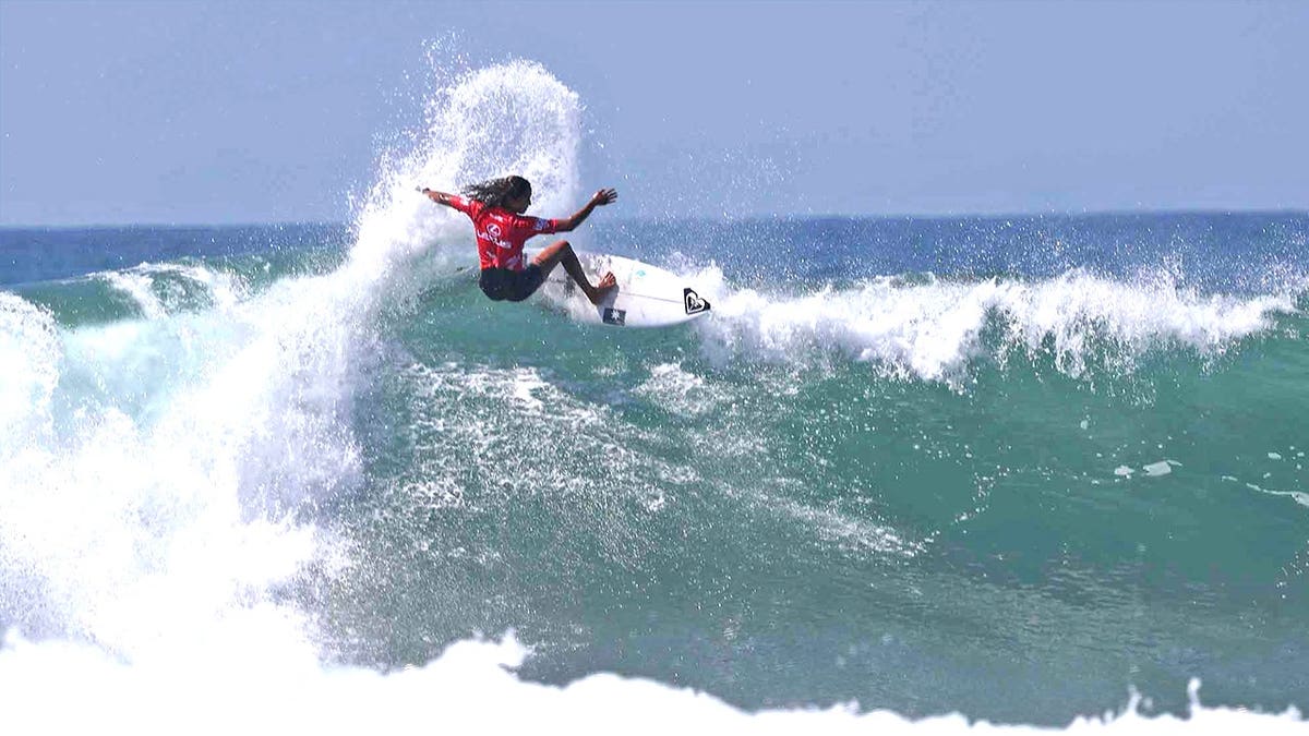 Surfer on giant wave in LA county