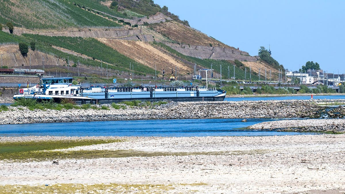 View of cruise ship on dried-up Rhine River
