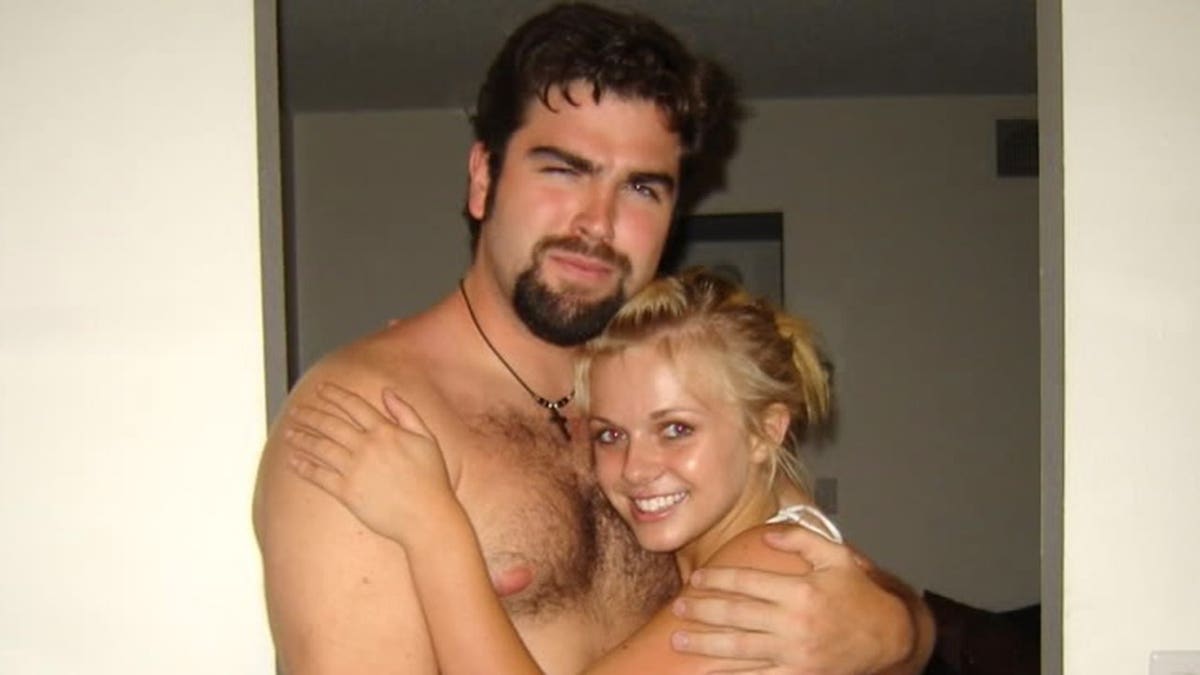 Daniel Wozniak embracing Rachel Buffett.