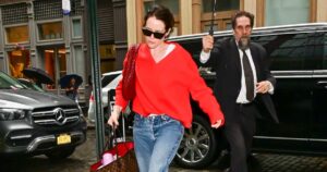 Claire Foy’s Bright Red Sweater Is a French-Girl Staple Made for the Summer-to-Fall Transition