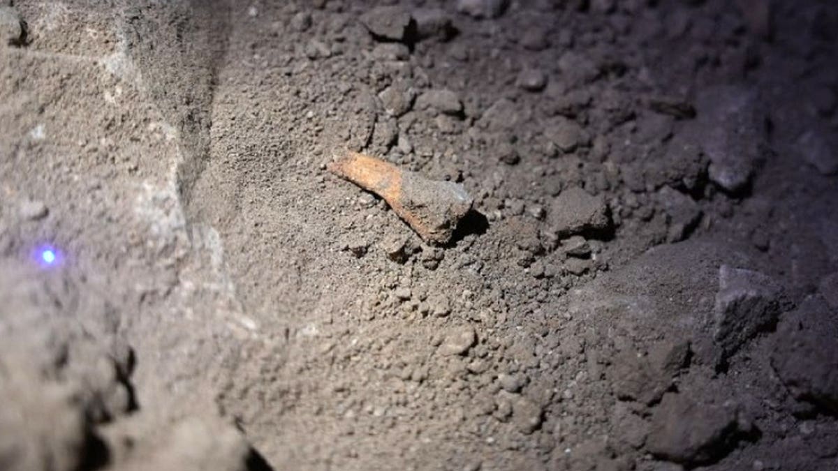 View of debris inside ancient cave