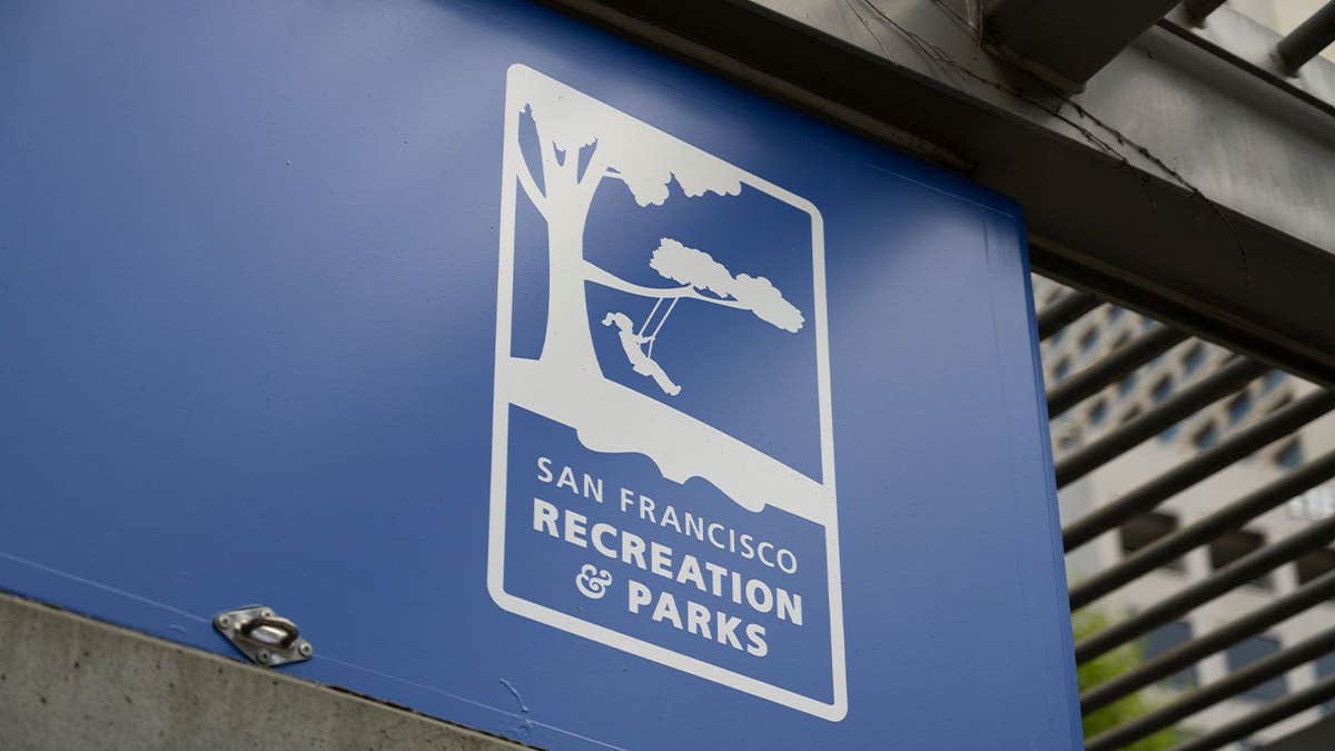 Close-up of a San Francisco Recreation and Parks Department sign on a concrete wall