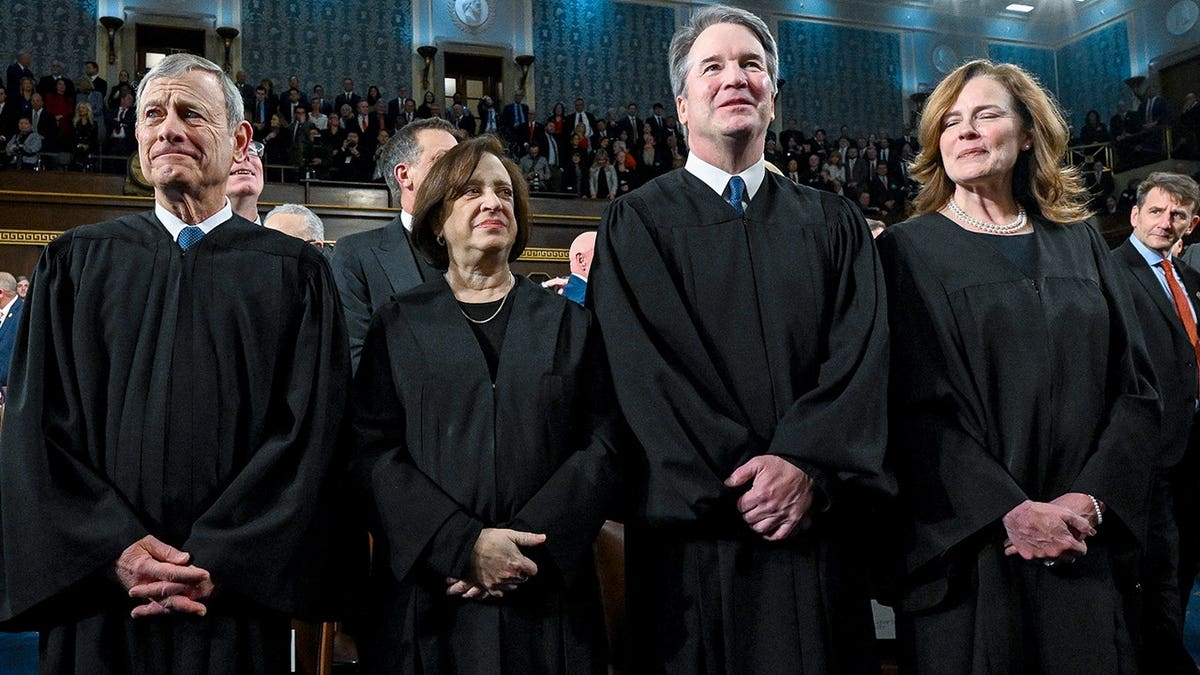 Chief Justice John G. Roberts Jr., Justice Elena Kagan, Justice Neil Gorsuch and Justice Amy Coney Barrett seated at the House Chamber.