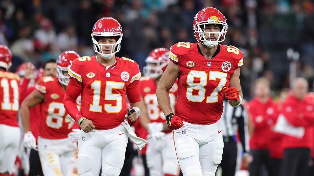 Travis Kelce and Patrick Mahomes look on during an NFL game in Frankfurt am Main, Germany.