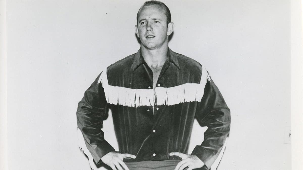 Dory Funk Jr. poses for photos against a plain background.