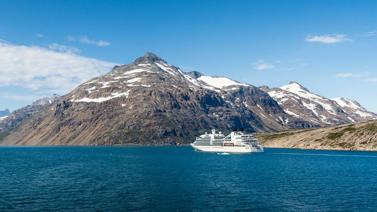 Small cruise ship sails through Prince Christian Sound, Greenland.