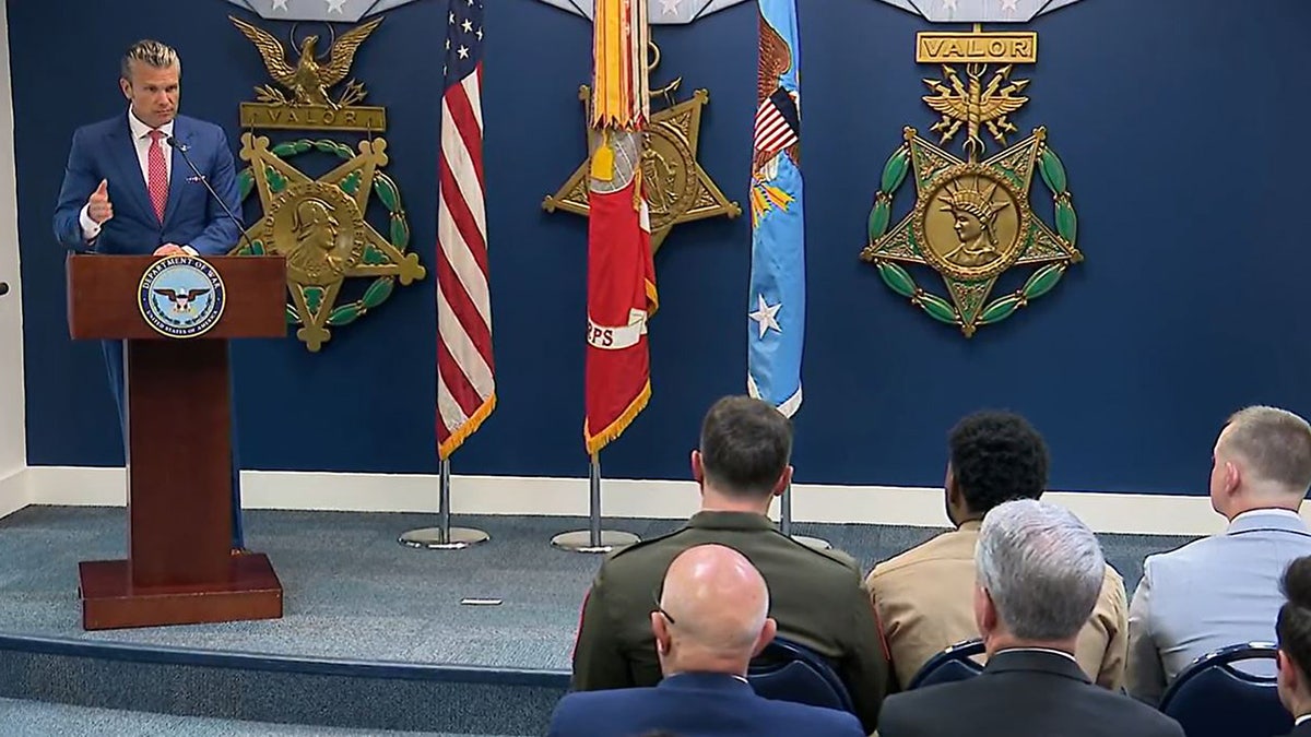 Secretary of War Pete Hegseth speaks Wednesday during valor awards upgrade ceremony for U.S. Marines who served at Abbey Gate in Kabul, Afghanistan, in 2021.