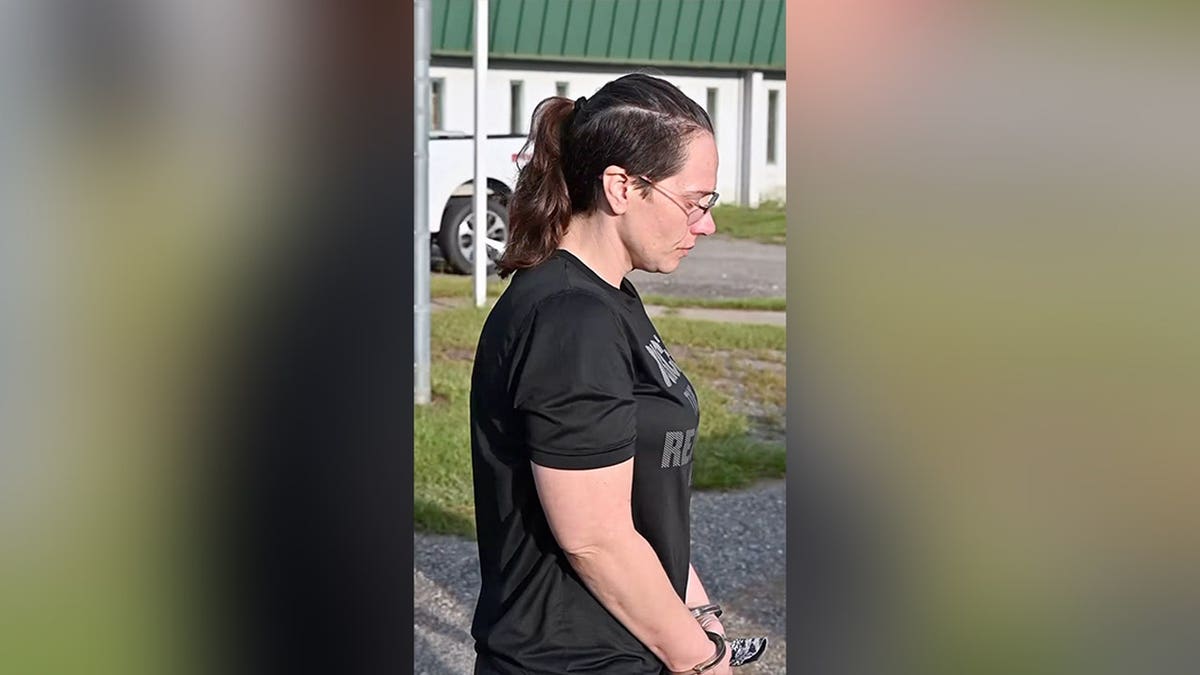 Isabelle Johnson is taken into custody