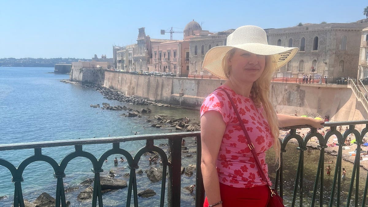Julie Sagoskin smiling in Italy.