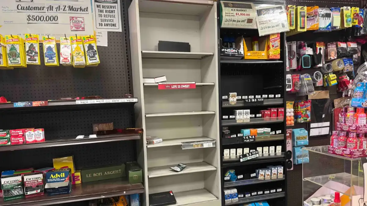 Empty shelves after the business was looted.