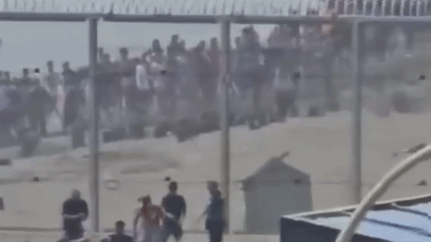 Migrants flooding Ceuta