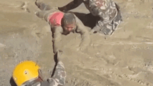 Trapped Nepali workers pulled from hydropower tunnel after catastrophic flooding
