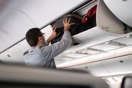 Australian airline Jetstar will charge passengers to use overhead lockers for their bags Australian airline Jetstar will charge passengers to use overhead lockers for their bags
