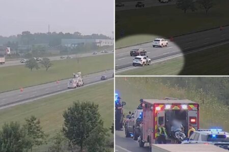 Suspect tries to evade Ohio cops by diving onto woman’s car while she’s zooming down the interstate: video