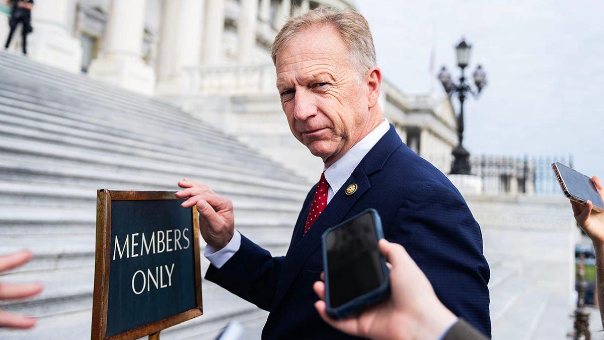 Rep. Kevin Hern talks with reporters outside the U.S. Capitol