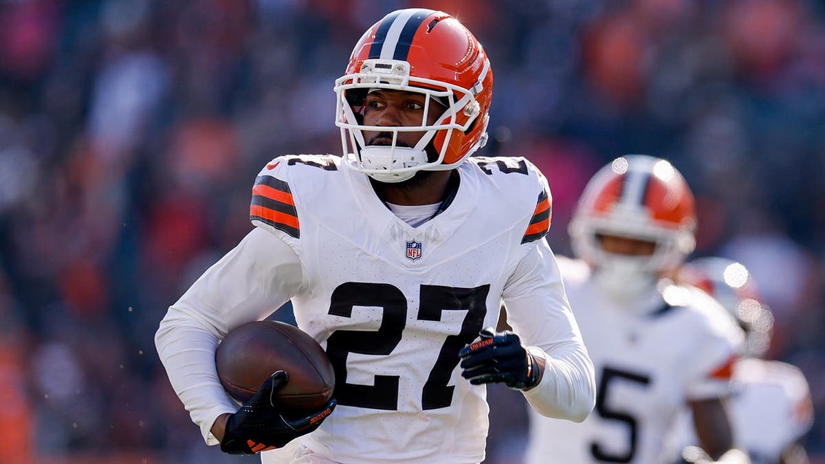 Sam Webb returns a fumble recovery during the game at Paycor Stadium.