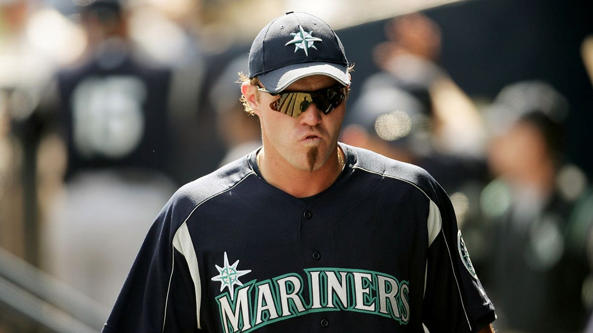 Scott Spiezio looks on during a Spring Training game against the San Diego Padres.