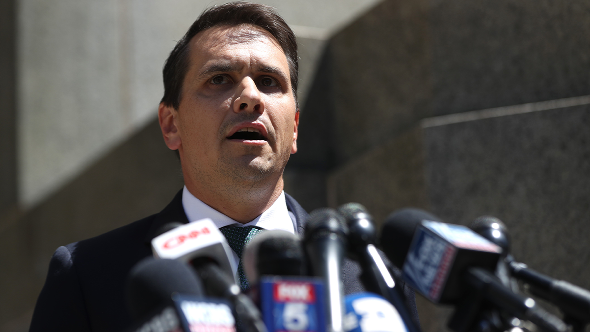Paul Manafort's attorney Todd Blanche delivers a speech to the press members