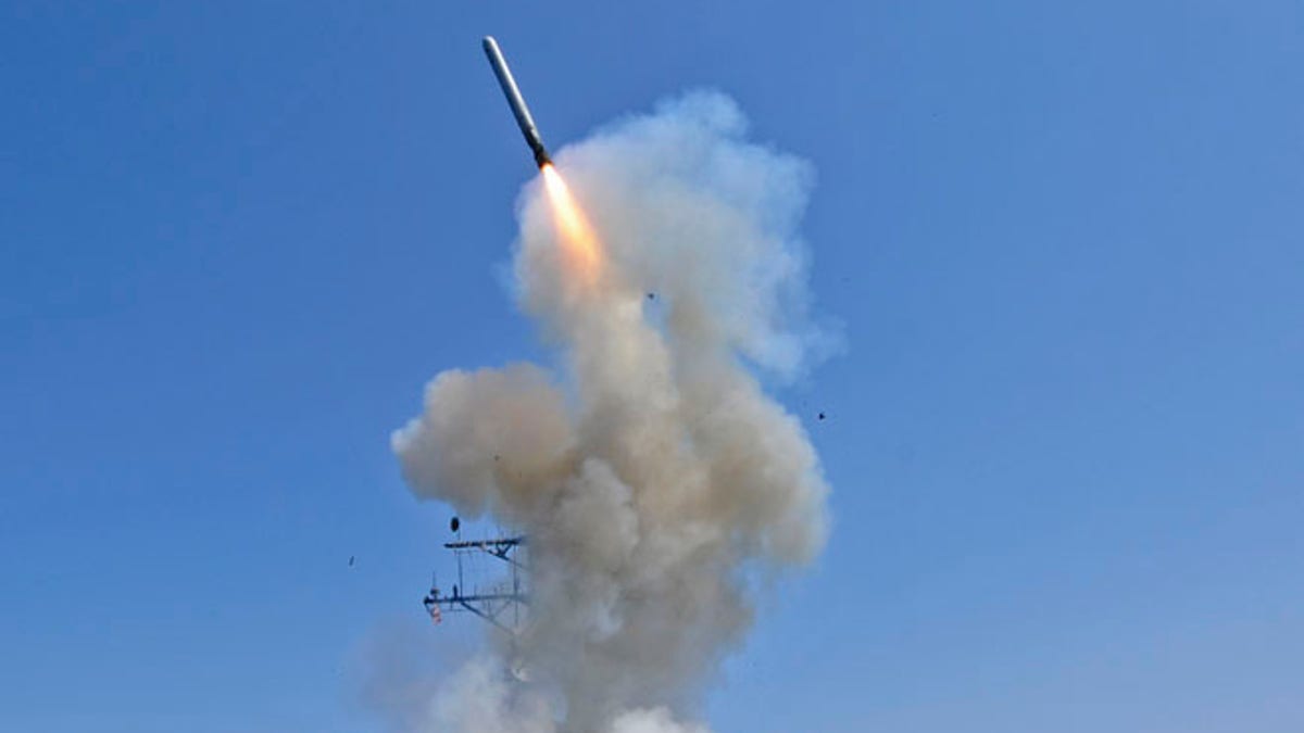 The guided-missile destroyer USS Barry launches a Tomahawk cruise missile from the ship's bow in the Mediterranean Sea in this U.S. Navy handout photo dated March 29, 2011. Barry is currently supporting Joint Task Force (JTF) Odyssey Dawn. JTF Odyssey Dawn is the U.S. Africa Command task force established to provide operational and tactical command and control of U.S. military forces supporting the international response to the unrest in Libya and enforcement of United Nations Security Council Resolution (UNSCR) 1973. REUTERS/Jonathan Sunderman/U.S. Navy//Handout (UNITED STATES - Tags: POLITICS MILITARY CIVIL UNREST CONFLICT) FOR EDITORIAL USE ONLY. NOT FOR SALE FOR MARKETING OR ADVERTISING CAMPAIGNS. THIS IMAGE HAS BEEN SUPPLIED BY A THIRD PARTY. IT IS DISTRIBUTED, EXACTLY AS RECEIVED BY REUTERS, AS A SERVICE TO CLIENTS - RTR2KM20