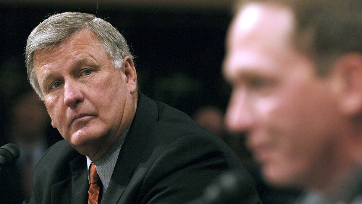 Tommy John, former Major League Baseball pitcher, looks on during Senate testimony in Washington.