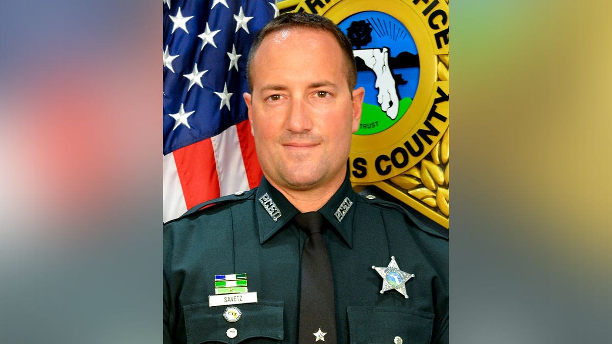 Troy Savetz poses in uniform for a Sheriff's Office headshot.