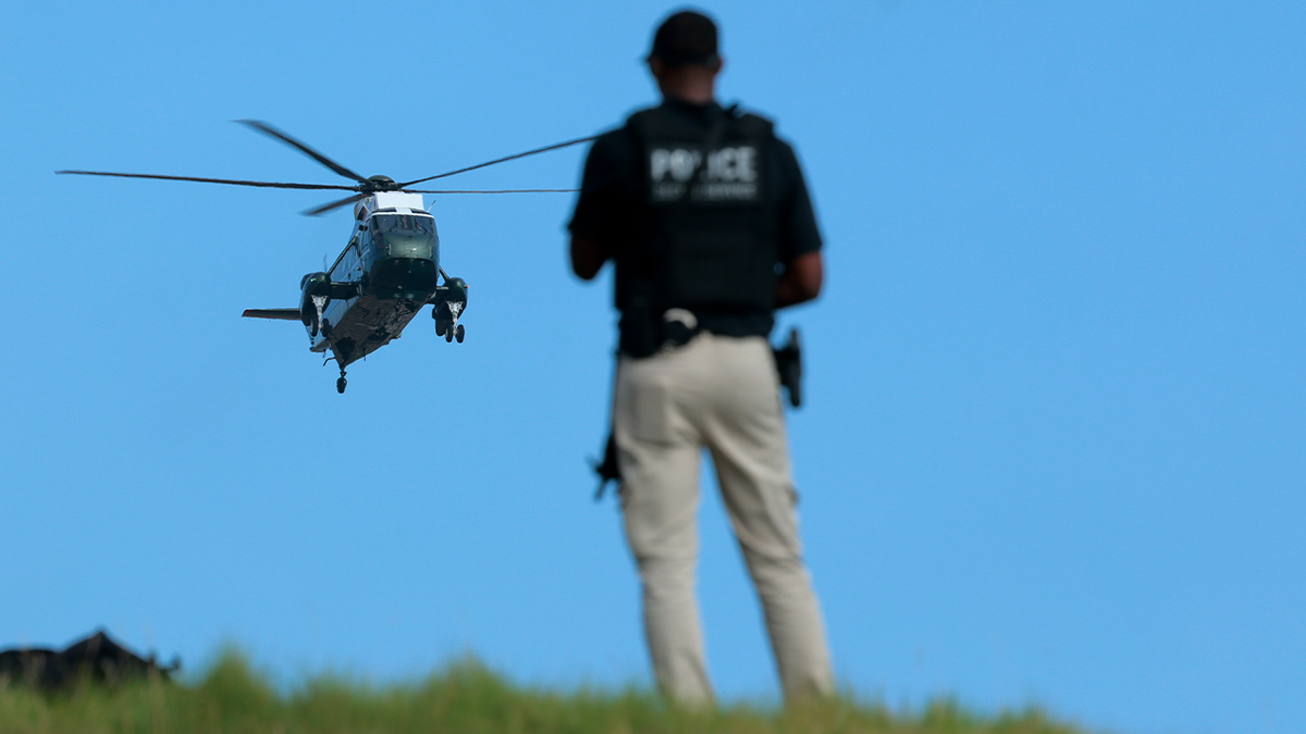 Trump arrives on Marine One.