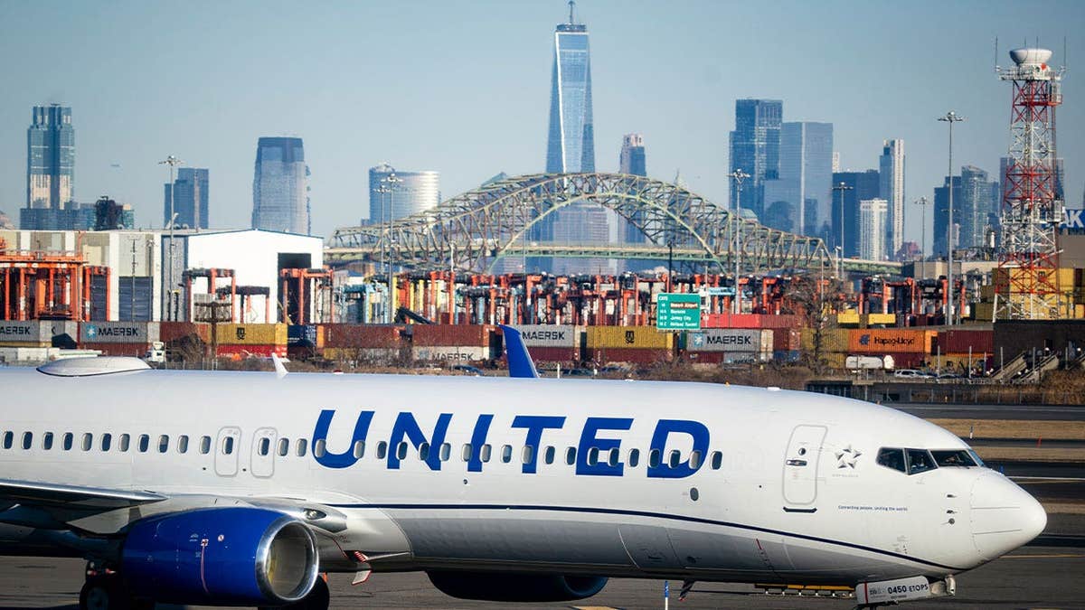 A United Airlines Boeing 737-900 on a runway at Newark Liberty International Airport in January 2026