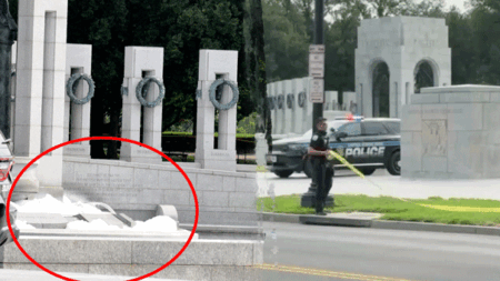 World War II Memorial on National Mall vandalized with pink spray paint; fountain overflowing with bubbles