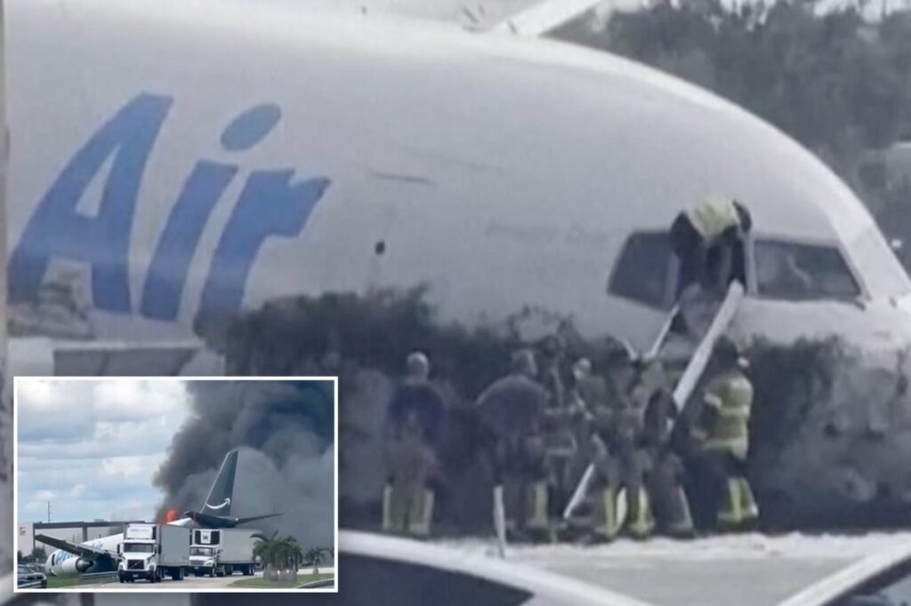 Miami firefighters seen climbing into Amazon cargo jet after shouting on dispatch ‘The plane is on fire’ Miami firefighters seen climbing into Amazon cargo jet after shouting on dispatch ‘The plane is on fire’