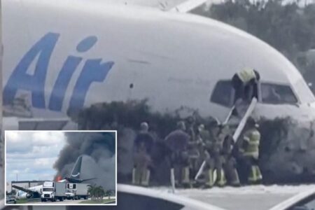 Miami firefighters seen climbing into Amazon cargo jet after shouting on dispatch ‘The plane is on fire’ Miami firefighters seen climbing into Amazon cargo jet after shouting on dispatch ‘The plane is on fire’