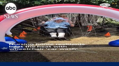 Nursing home residents beat the heat with wheelchair ‘car wash’ Nursing home residents beat the heat with wheelchair ‘car wash’