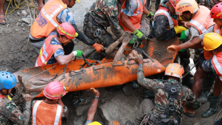 Trapped Nepal workers pulled alive from tunnel 9 days after deadly flooding, raising hope for more rescues