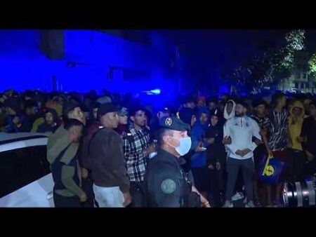 Police fire shots in the air as thousands of migrants moved to new facility in Ceuta Police fire shots in the air as thousands of migrants moved to new facility in Ceuta