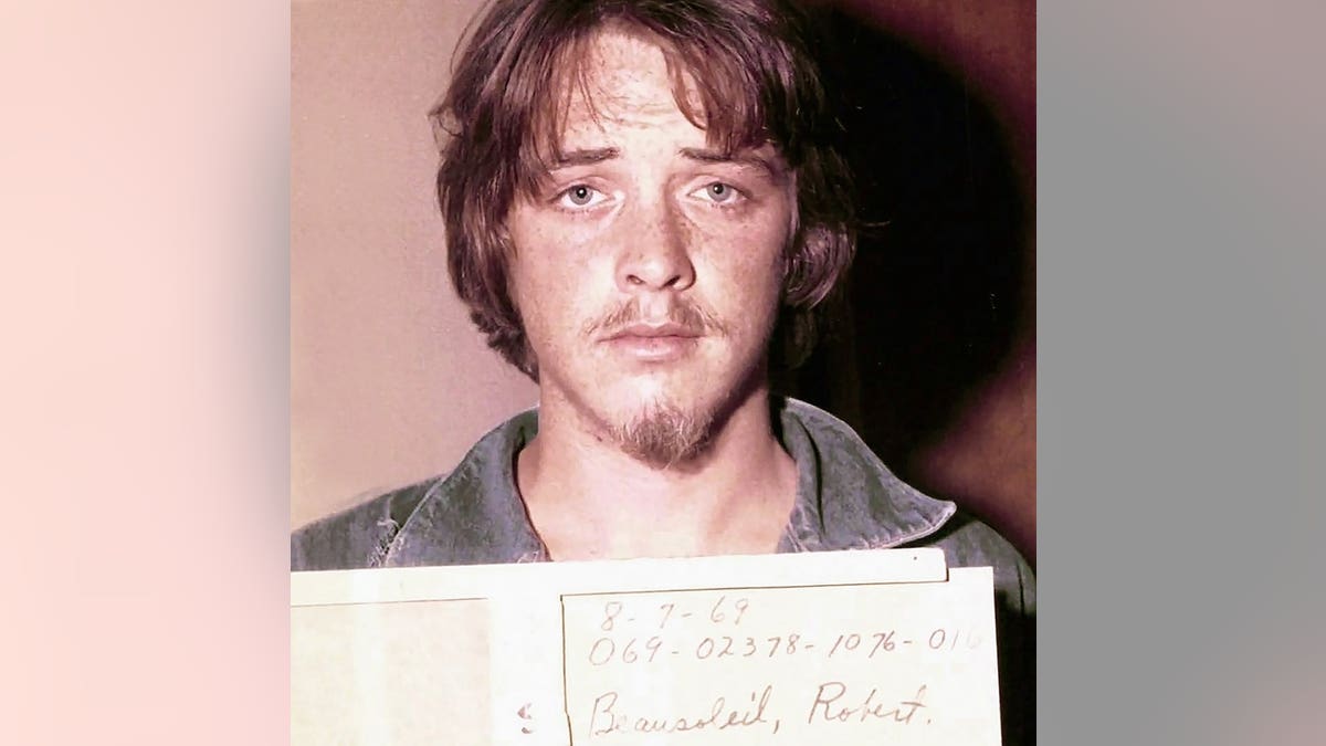 Robert Beausoleil poses for a mugshot after his arrest.