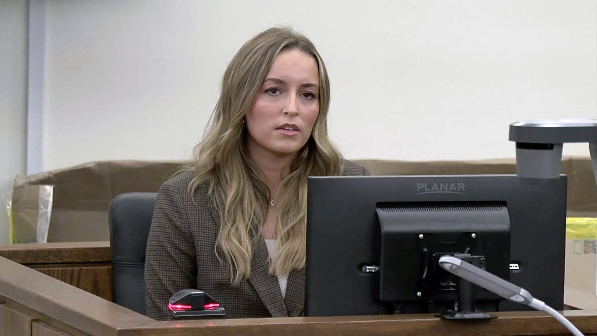 Alleigha Botner sits on the witness stand while testifying in Caleb Flynn's Ohio murder trial.