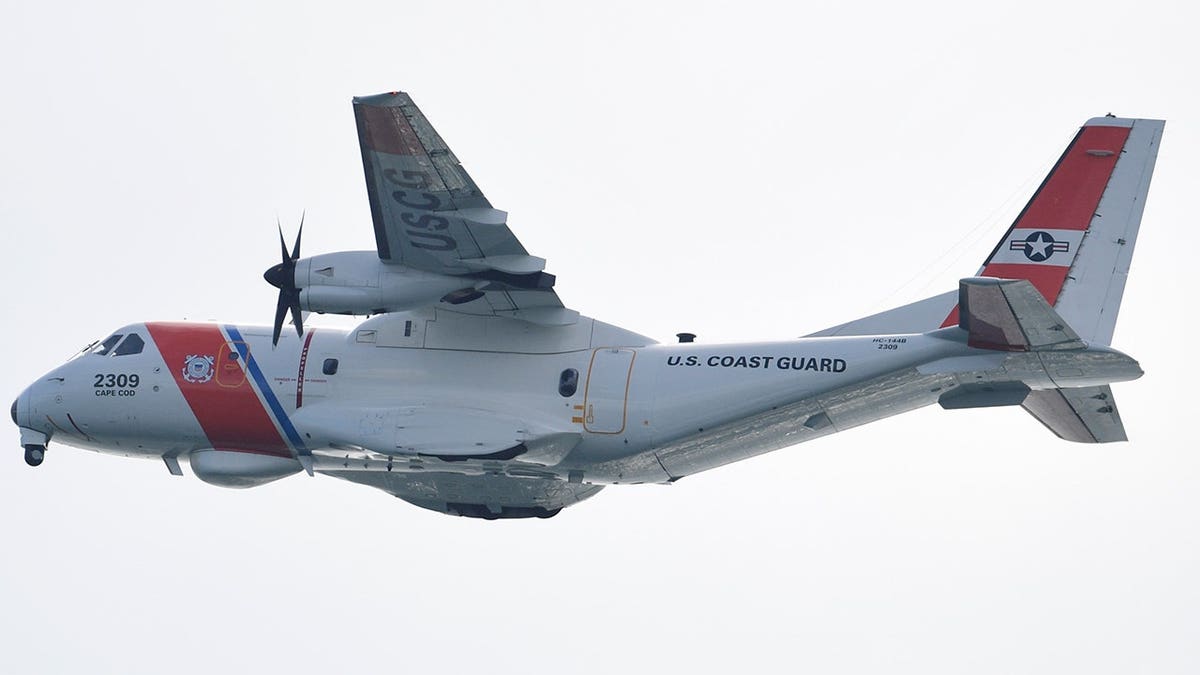 U.S. Coast Guard HC-144 Ocean Sentry surveillance plane flies over the Atlantic Ocean.