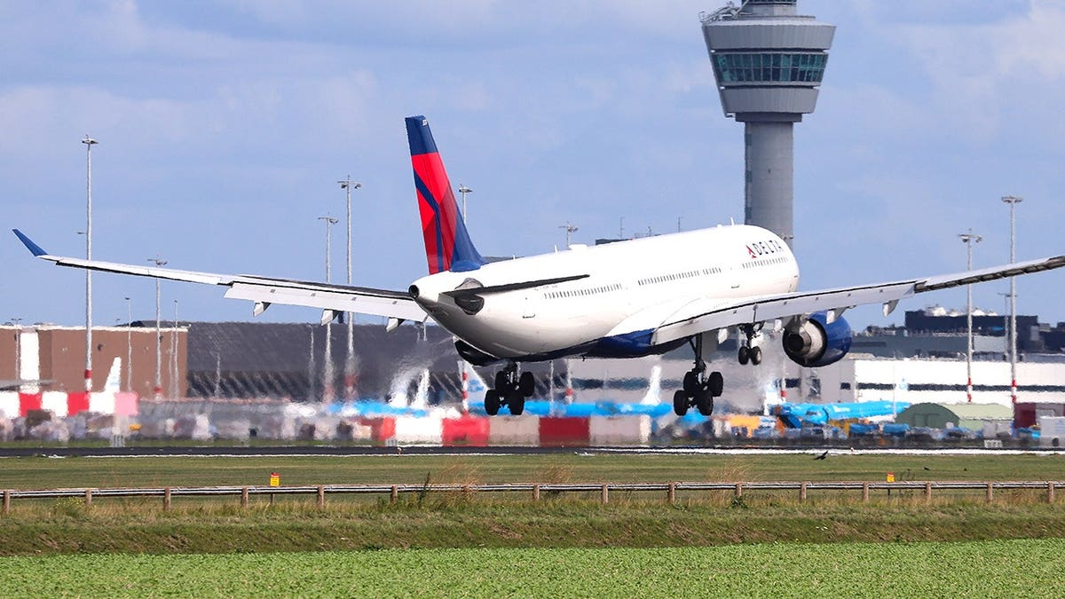 View of Delta plane on runway