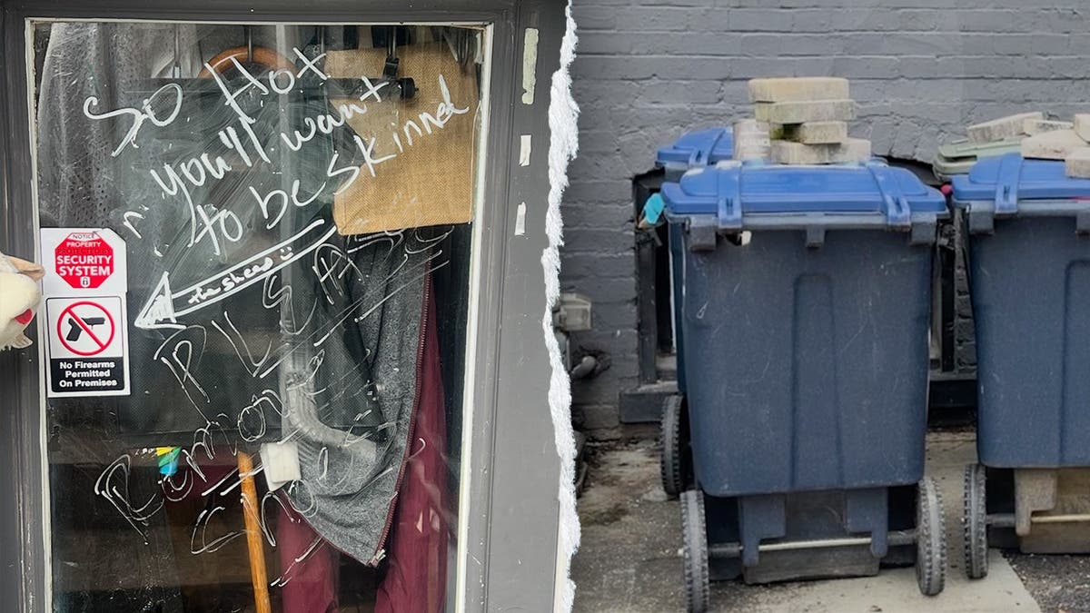 A vandalized apartment door and barricade