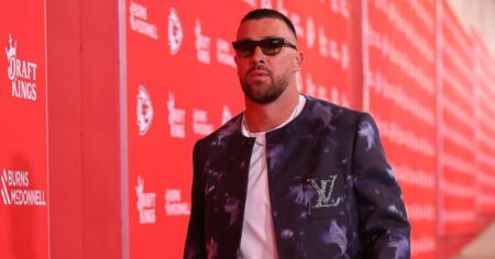 Travis Kelce Looks Sharp in a K Louis Vuitton Jacket at Kansas City Chiefs Game Travis Kelce Looks Sharp in a K Louis Vuitton Jacket at Kansas City Chiefs Game