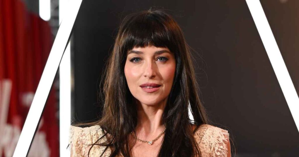 Dakota Johnson Shows Glimpse of Black Lingerie in Sheer Lace Dress at ‘Verity’ London Premiere